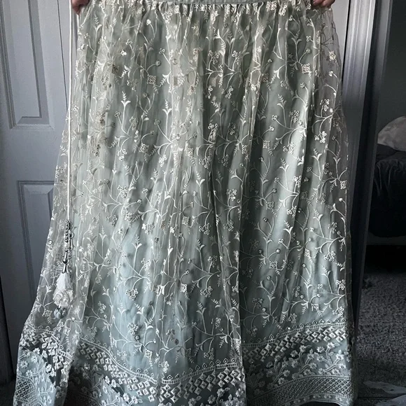 Turquoise Net Embroidered Lehenga Choli - Picture 6 of 9